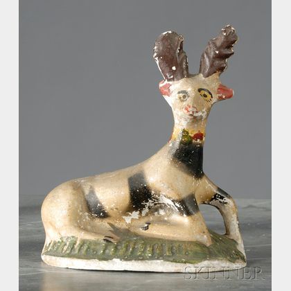 Painted Chalkware Figure of a Recumbent Deer