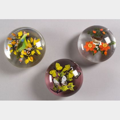 Three Rick Ayotte Glass Paperweights