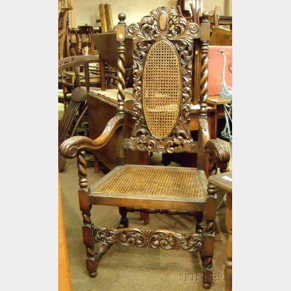 Jacobean-style Caned Carved Walnut Armchair. 
