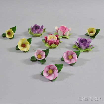 Ten Herend and Crown Staffordshire Porcelain Flowers. Estimate $200-250
