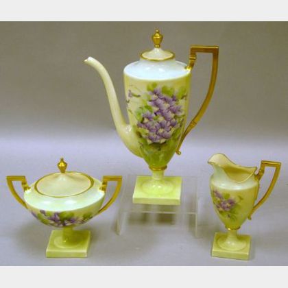 Three-Piece American Belleek Hand-painted Violet Decorated Porcelain Coffee Set. 