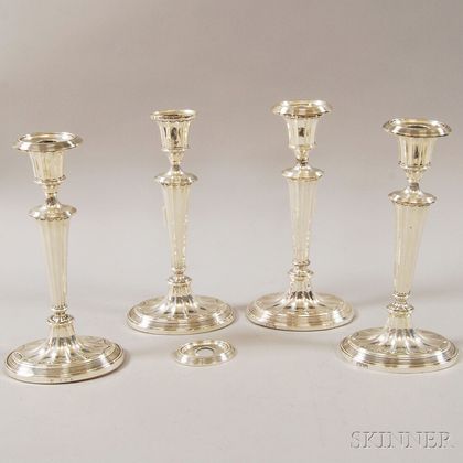 Suite of Four Weighted English Silver Candlesticks