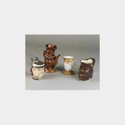 Group of Four Pottery Character Jugs