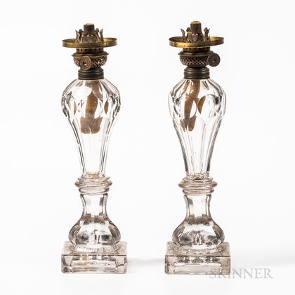 Pair of Blown Molded Colorless Glass Fluid Lamps
