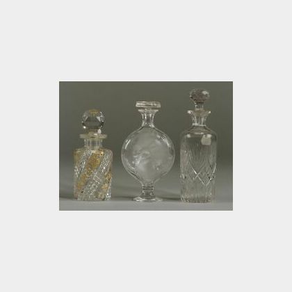 Collection of Eight Colorless Glass Cologne Bottles