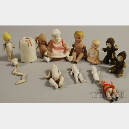 Twelve Miniature Bisque Dolls Including Kewpie