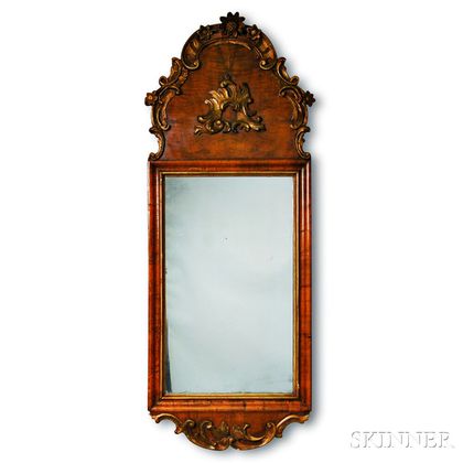 Northern European Rococo-style Carved and Gilt Walnut Mirror