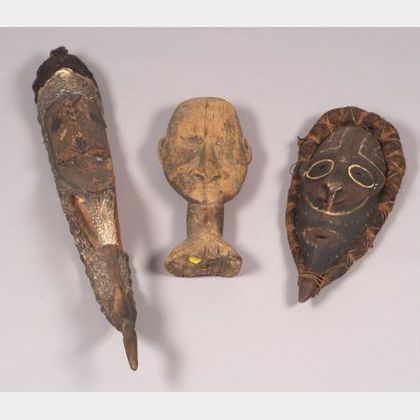 Three Carved Wood New Guinea Masks