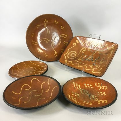 Five Slip-decorated Redware Pottery Dishes