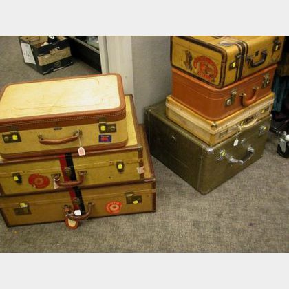Eight Assorted Mid-20th Century Suitcases