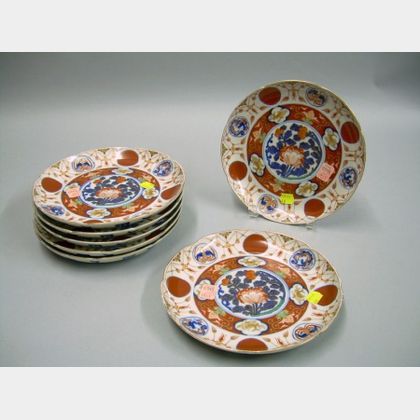 Three Japanese Blue and White Decorated Porcelain Plates and a Cloisonne Plate. 