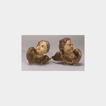 Pair of Carved and Painted Wood Cherub Wall Plaques