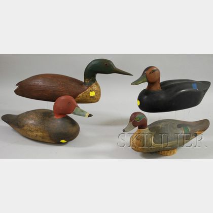 Four Carved and Painted Wooden Duck Decoys