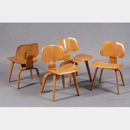 Four Charles and Ray Eames DCW Chairs