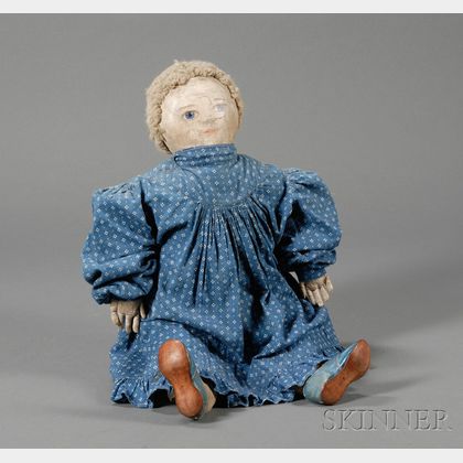 Folk Art Doll Wearing a Blue Dress and Shoes