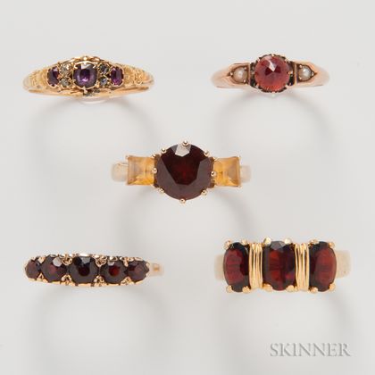 Four Gold and Garnet Rings