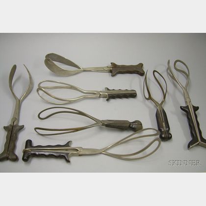Seven Pairs of Obstetrical Forceps