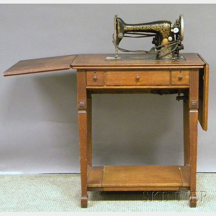 Regency-style Oak and Singer Electric Sewing Machine Table. 
