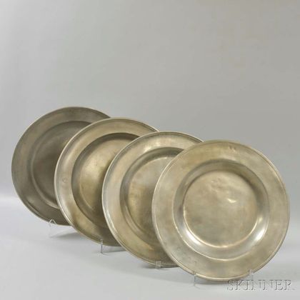 Four Large Pewter Chargers