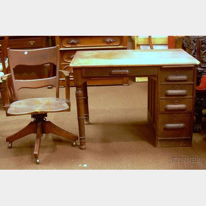 Early 20th Century Oak Flat-top Desk with Four-Drawer Pedestal and Swivel Desk Armchair