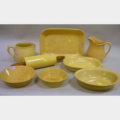 Yellowware Rolling Pin, Two Pitchers, and Five Bowls. 