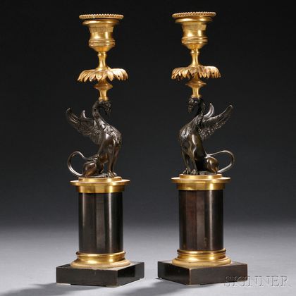 Pair of Neoclassical Patinated Bronze Figural Candlesticks