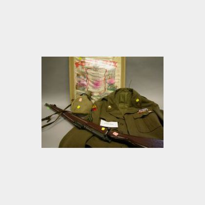 U.S. Army Jacket, Two Leather Cartridge Cases, Practice Rifle, Canteen, Leather Navigation Case and a Framed Fort Dix Souvenir Banner. 