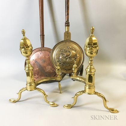 Two Brass and Copper Bedwarmers and a Pair of Brass Andirons. Estimate $200-400