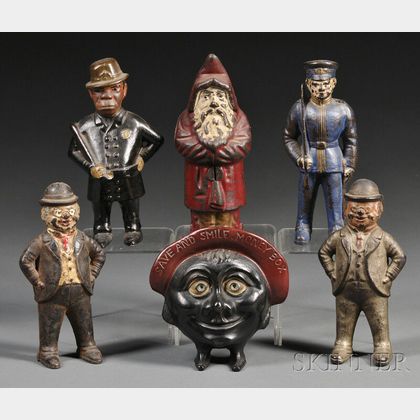 Six Cast Iron Standing Figural Banks