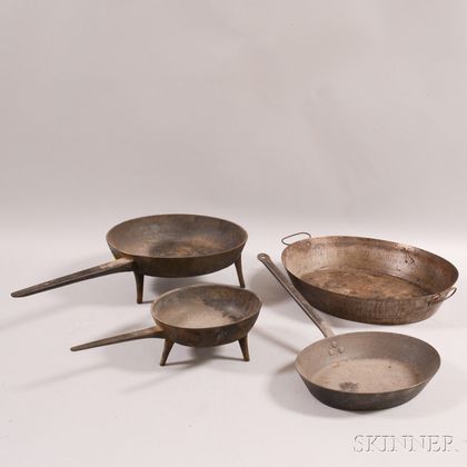 Four Iron Cooking Vessels