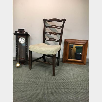 Georgian Mahogany Ribbon-back Side Chair, a Carved Walnut Wall Clock, and a Maple Ogee Mirror. Estimate $20-200