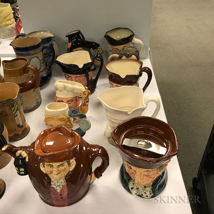 Nine Royal Doulton Character Jugs and a Teapot. Estimate $400-600
