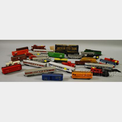 Group of Toy Train Locomotives, Cars, and Assorted Material