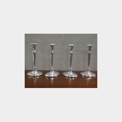 Set of Four English Sterling Silver Candlesticks. 