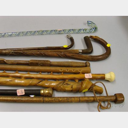Six Assorted Walking Sticks and Four Canes