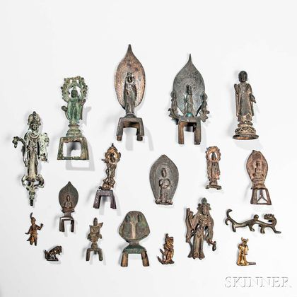 Eighteen Mostly Buddhist Archaic Gilt-bronze and Bronze Miniature Items