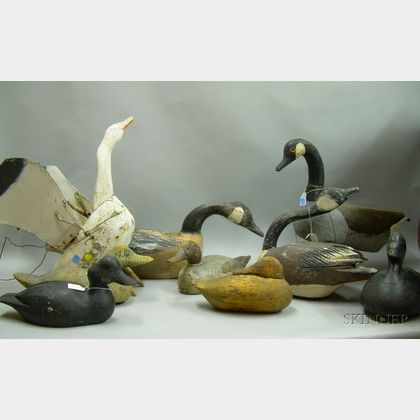 Five Carved and Painted Wooden Duck Decoys and Four Canada Goose Decoys