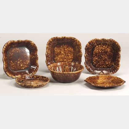 Five Rockingham Glazed Pottery Dishes and a Pudding Mold