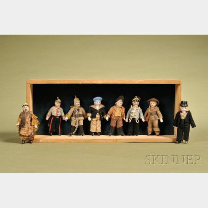 Eight Small Bisque Gentlemen Figures in Shadowbox