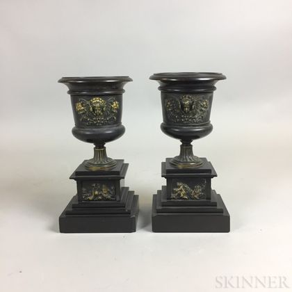 Pair of Neoclassical-style Bronze Urns on Stone Pedestals