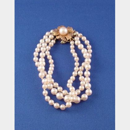 Triple Strand Pearl Bracelet and 14kt Gold Pearl Studded Floriform Clasp. 