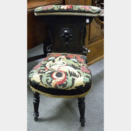 Victorian Renaissance Revival Needlepoint Upholstered Ebonized Parlor Chair. 