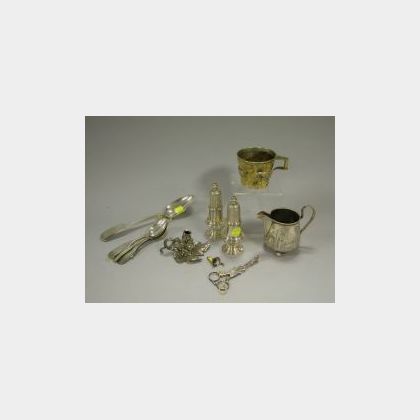 Pair of Sterling Silver Casters, Gilt Repousse Cup, Sugar Tongs, Eight Coin Silver Spoons, a Plated Leaf Figural Chamberstick and a Cre