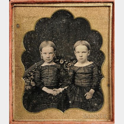 Sixth-plate Daguerreotype of Sisters on Floral Covered Sofa