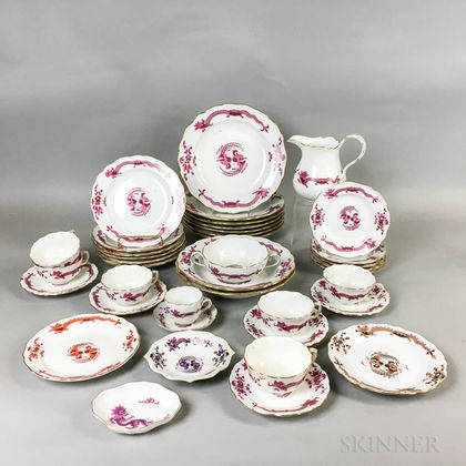 Thirty-nine Pieces of Meissen Pink Dragon and Bird Porcelain Tableware. Estimate $400-600