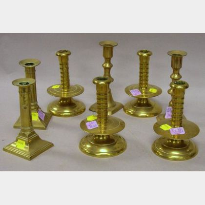 Set of Four Brass Mid-drip Candlesticks and Two Pairs of Brass Candlesticks. 