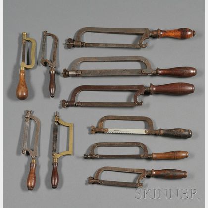 Ten Wood-Handled Brass and Steel Hacksaws