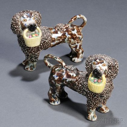 Pair of Porcelain Poodles with Baskets of Flowers