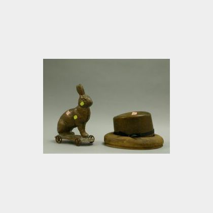 Wooden Fedora Hat Mold and a Molded Copper Rabbit on Wheels. 