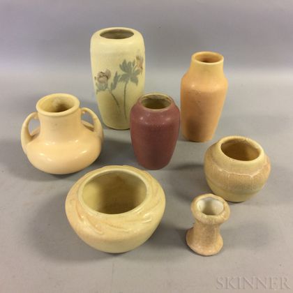 Seven Hampshire Pottery Mostly Cream-glazed Vessels